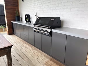 Beefeater Signature 3000E 4 Burner Built In Corian Dove with Metallic Charcoal Cabinets Outdoor Kitchen