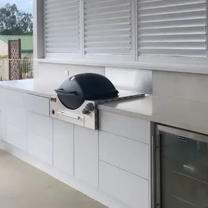 Weber Q3600 Black Hood with White Cabinets